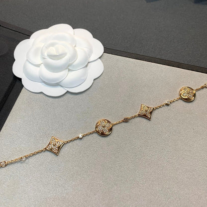 [KELA]STAR AND SUN 4 MOTIFS GOLD DIAMONDS BRACELET