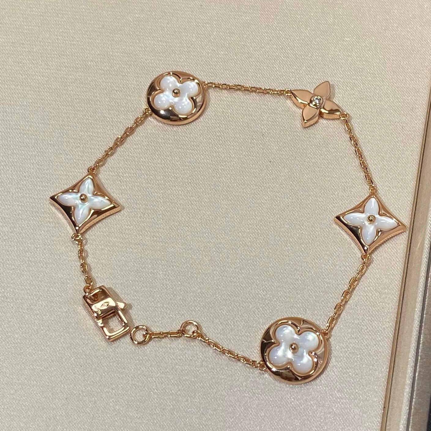 [KELA]STAR AND SUN 5 MOTIF MOP ROSE GOLD BRACELET