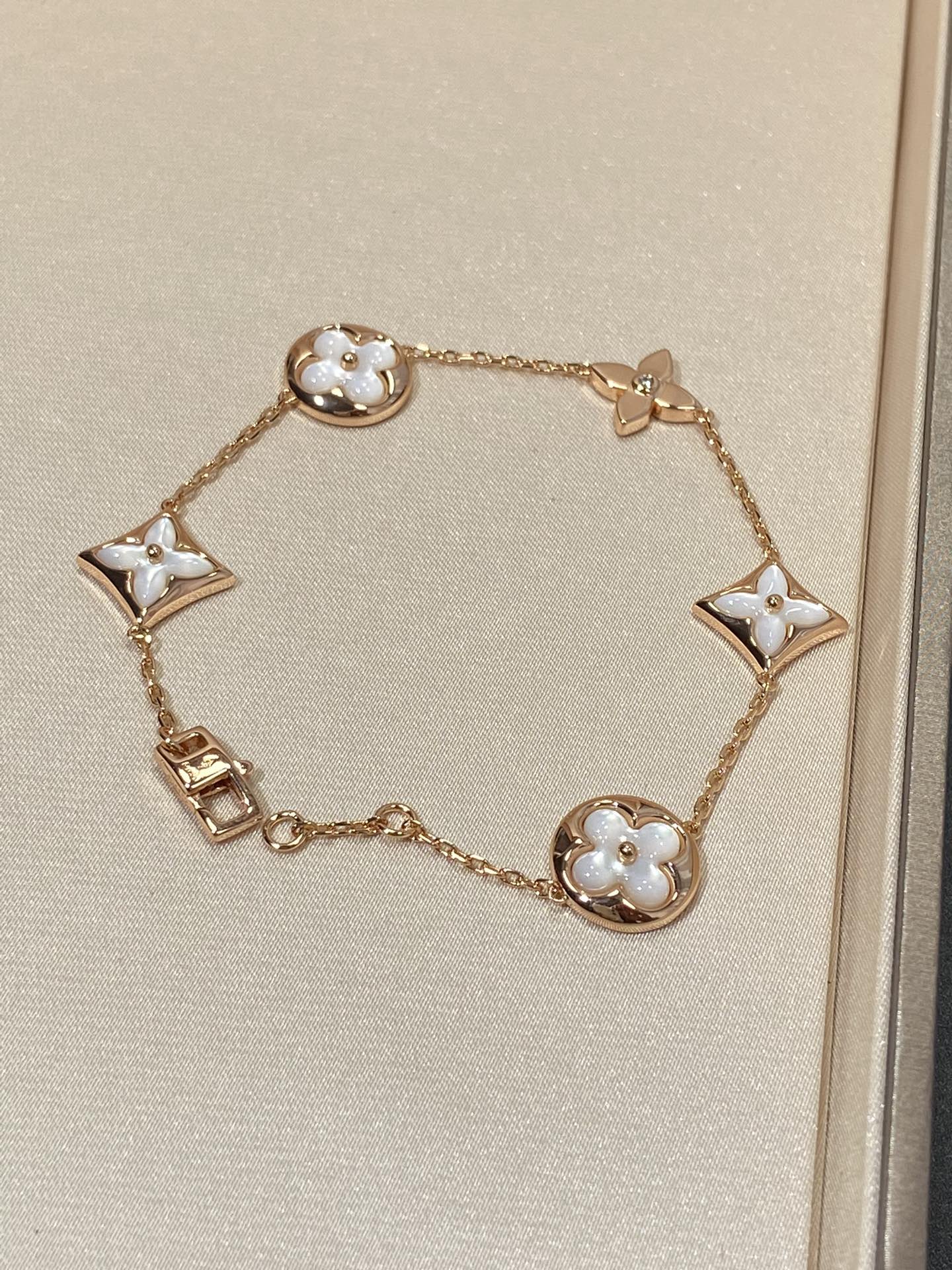 [KELA]STAR AND SUN 5 MOTIF MOP ROSE GOLD BRACELET