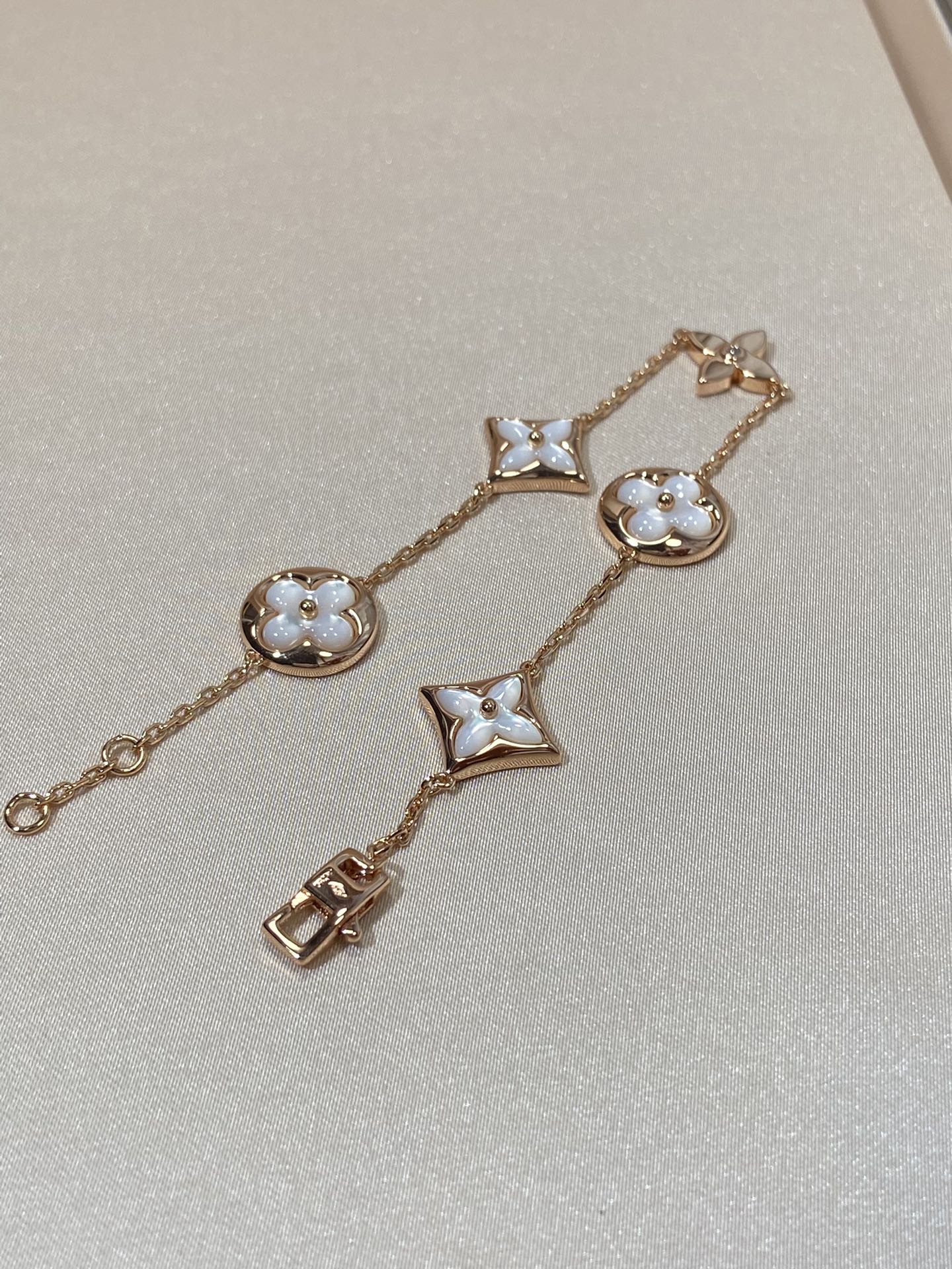 [KELA]STAR AND SUN 5 MOTIF MOP ROSE GOLD BRACELET