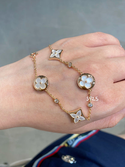 [KELA]STAR AND SUN 4 MOTIF WHITE MOP ROSE GOLD BRACELET