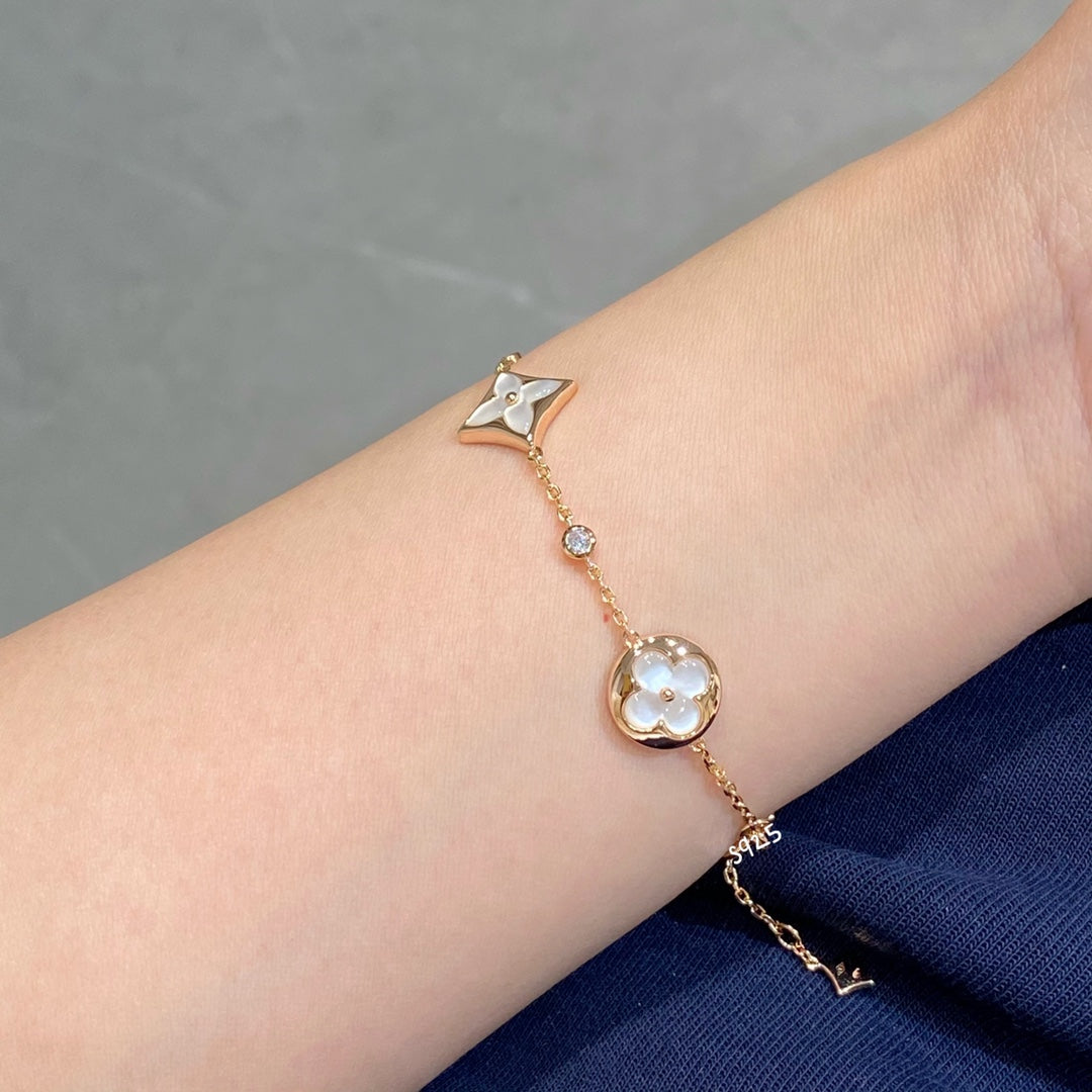[KELA]STAR AND SUN 4 MOTIF WHITE MOP ROSE GOLD BRACELET
