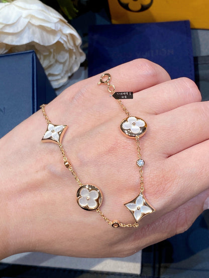 [KELA]STAR AND SUN 4 MOTIF WHITE MOP ROSE GOLD BRACELET