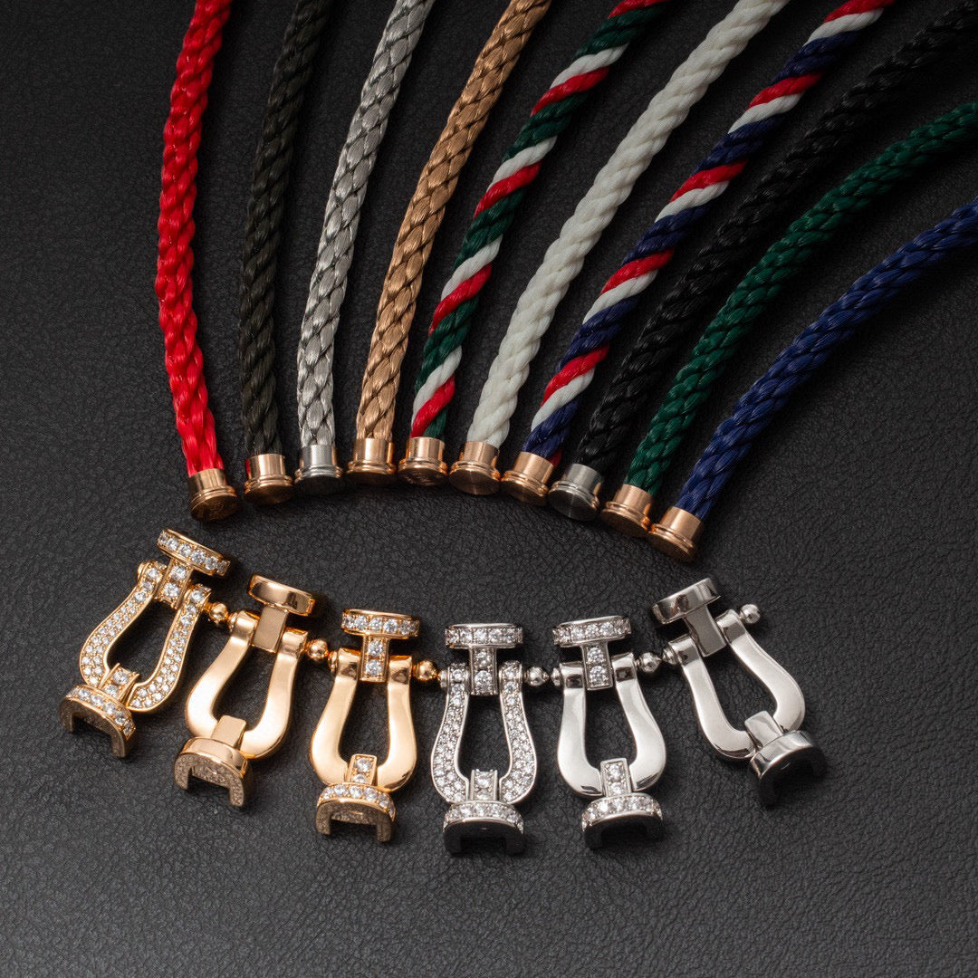 [KELA]FORCE LARGE HORSESHOE HALF DIAMOND BRACELET - GOLD
