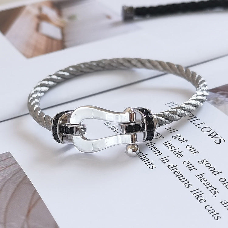 [KELA]FORCE LARGE HORSESHOE BLACK DIAMOND BRACELET - WHITE GOLD