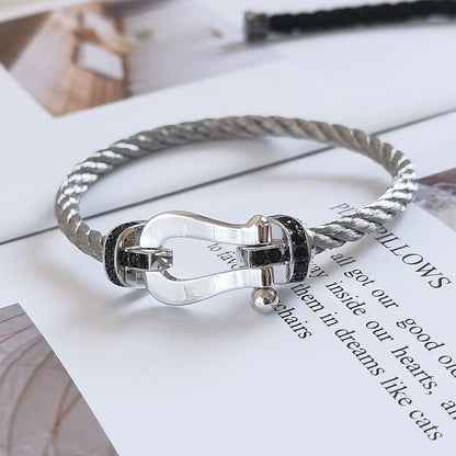 [KELA]FORCE LARGE HORSESHOE BLACK DIAMOND BRACELET - WHITE GOLD