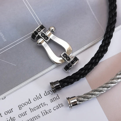 [KELA]FORCE LARGE HORSESHOE BLACK DIAMOND BRACELET - WHITE GOLD